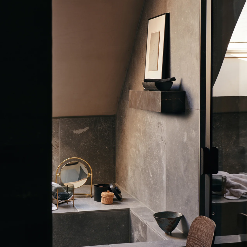 Marble floating shelf in grey by Audo Copenhagen in bathroom