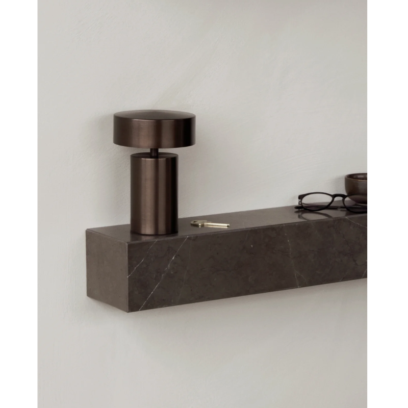 Marble floating shelf in grey by Audo Copenhagen in home office.