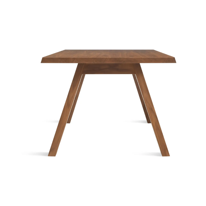 The 72 inch A Walk in the Park Dining Table from Blu Dot in walnut from the side.