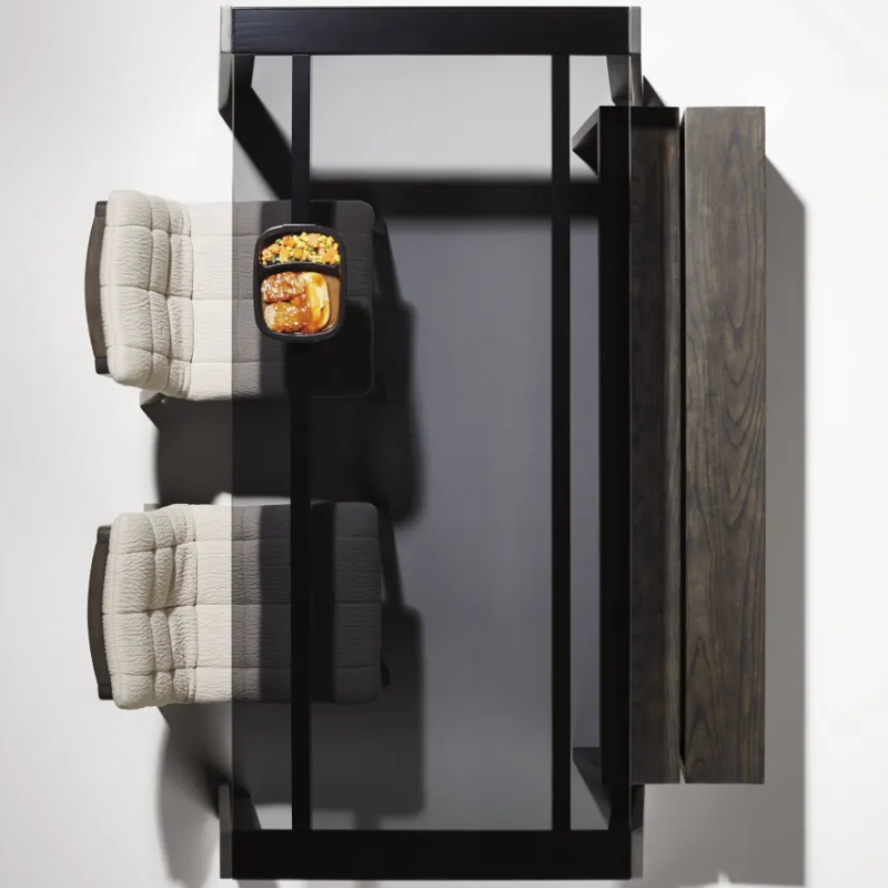 The Amicable Split 60" Bench from Blu Dot in walnut in a family room.