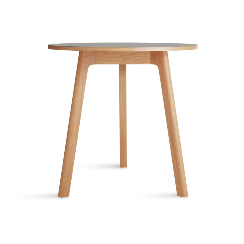 The 30 inch Apt Café Table from Blu Dot with putty table top and white oak body.