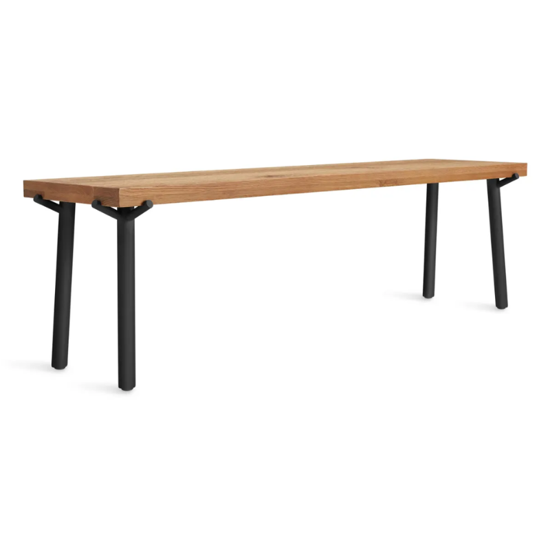 The Branch Bench from Blu Dot in oak and black from an angle.