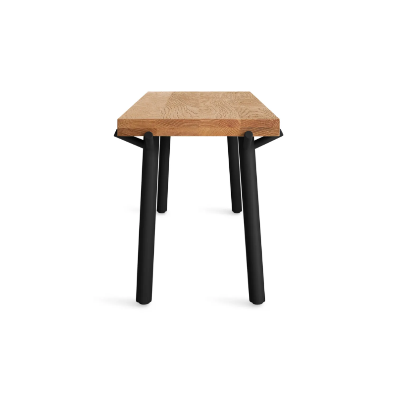 The Branch Bench from Blu Dot in oak and black from the side.
