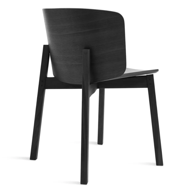 The Buddy Chair from Blu Dot in black on ash from the back at an angle.