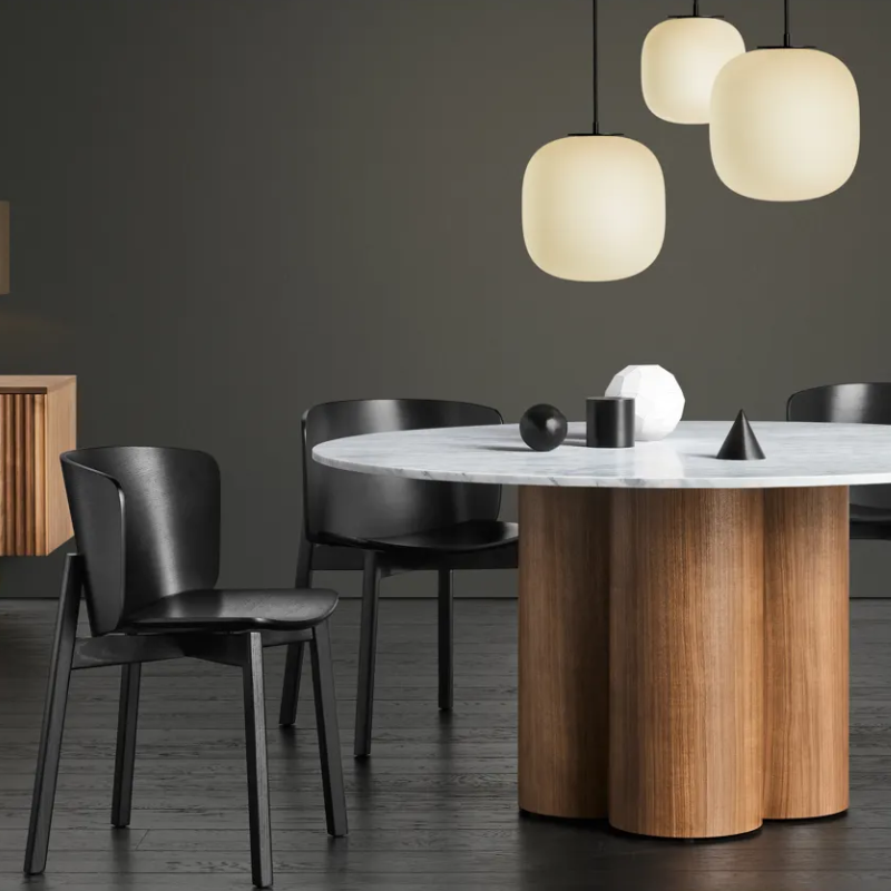 The Buddy Chair from Blu Dot in black on ash in a living room.