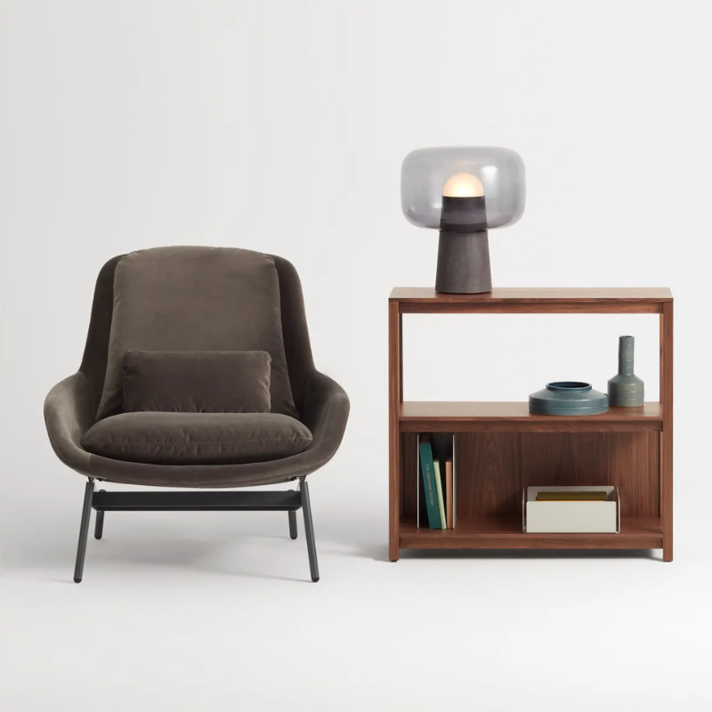 The Bully Table Lamp from Blu Dot in a family room.