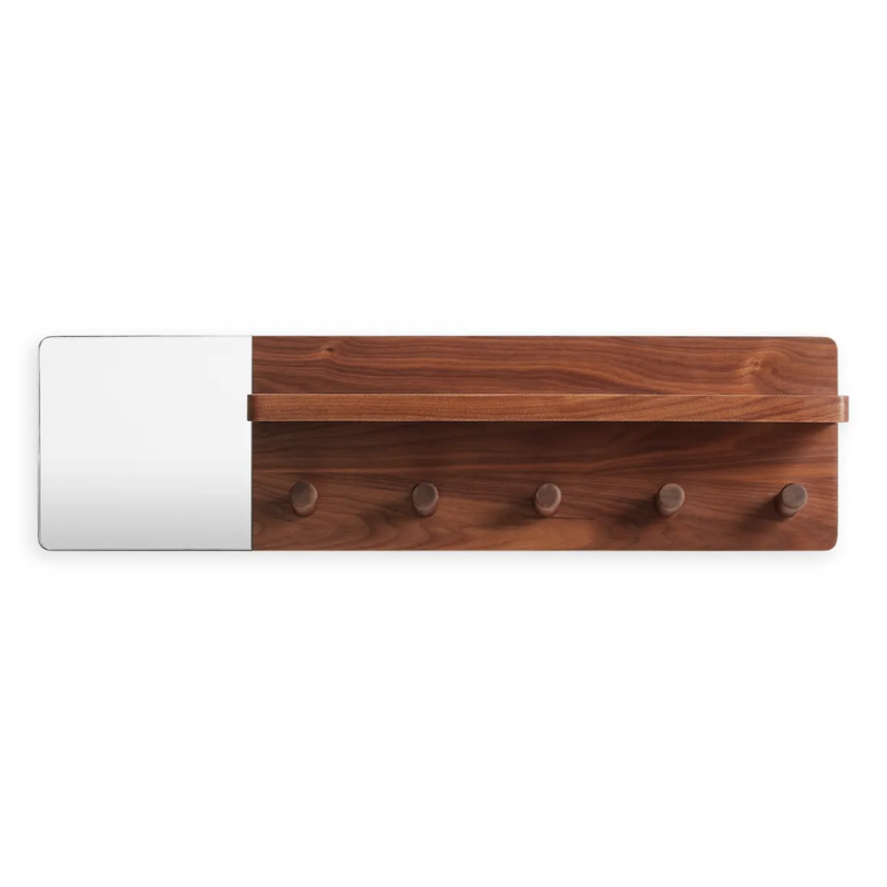 The Candid Wall Shelf with Hooks from Blu Dot in walnut.
