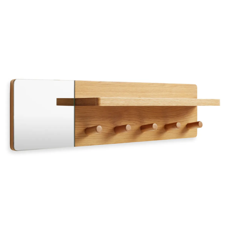 The Candid Wall Shelf with Hooks from Blu Dot in white oak from an angle.