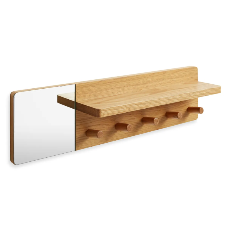 The Candid Wall Shelf with Hooks from Blu Dot in white oak from a high angle.