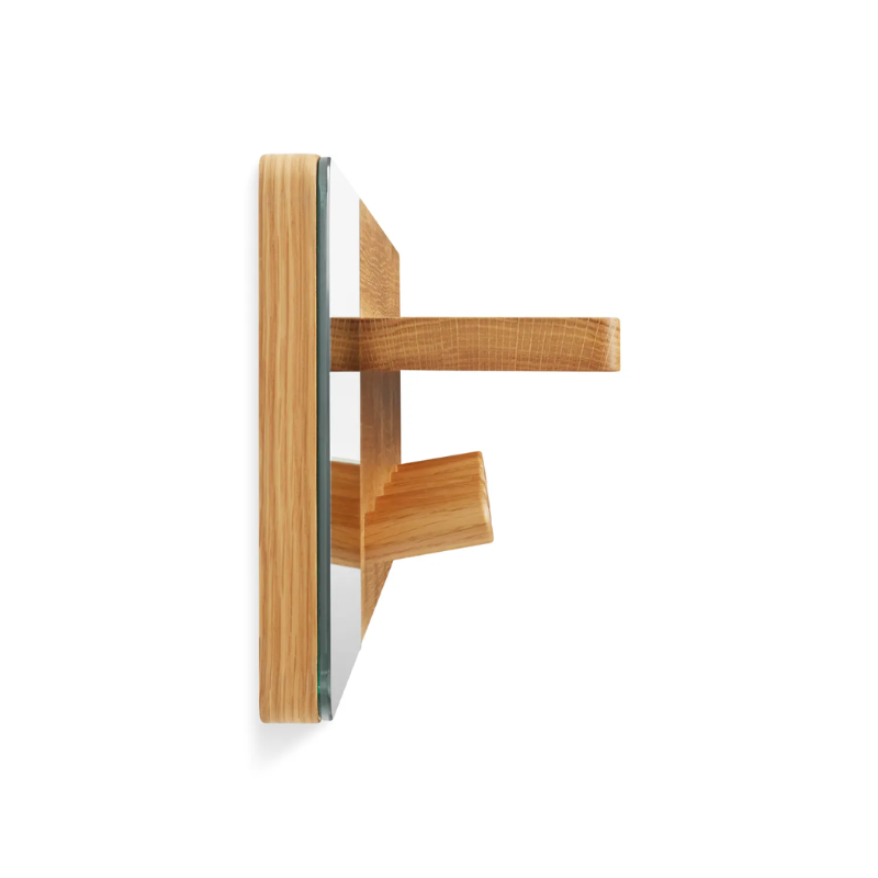The Candid Wall Shelf with Hooks from Blu Dot in white oak from the side.
