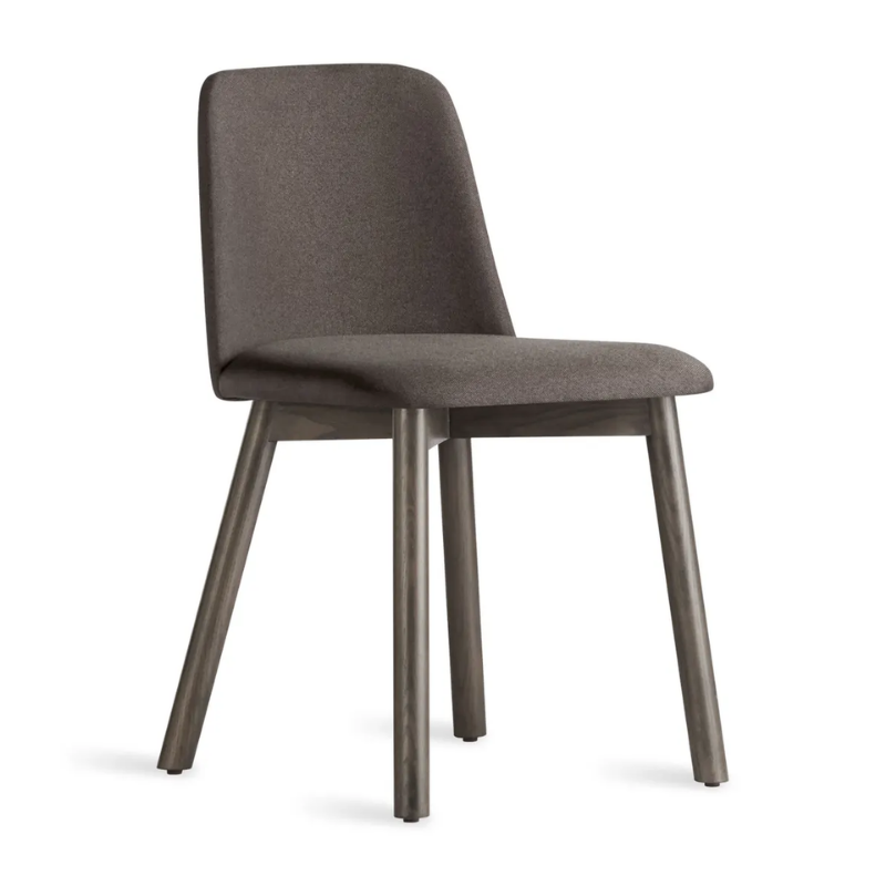 The Chip Chair from Blu Dot with smoke legs and gunmetal upholstery from an angle.