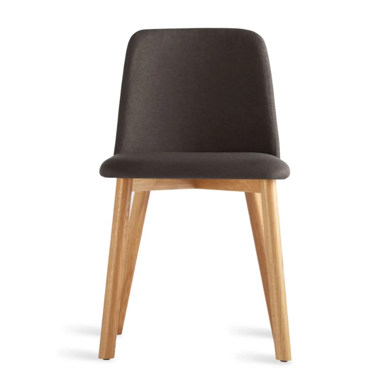 The Chip Chair from Blu Dot with white oak legs and gunmetal upholstery.