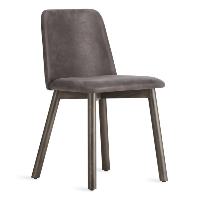 The Chip Chair from Blu Dot with smoke legs and slate leather upholstery from an angle.