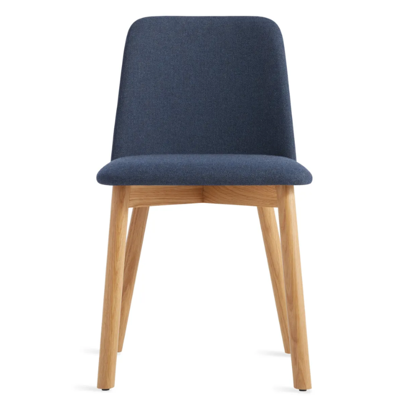 The Chip Chair from Blu Dot with white oak legs and toohey navy upholstery.
