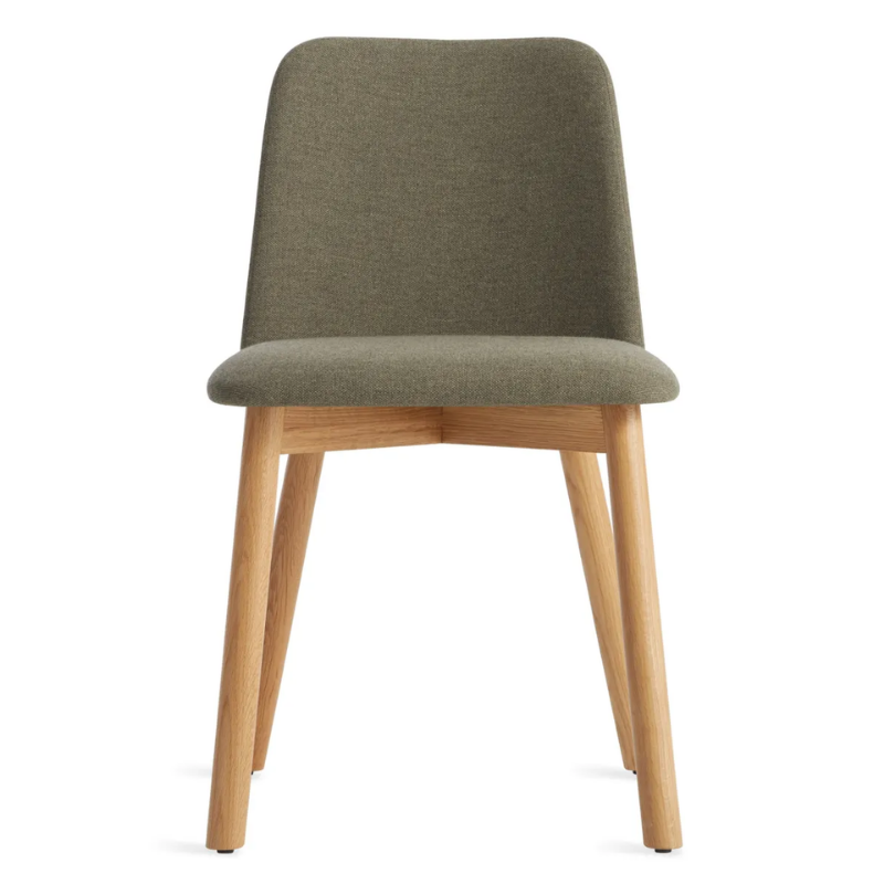 The Chip Chair from Blu Dot with white oak legs and toohey olive upholstery.