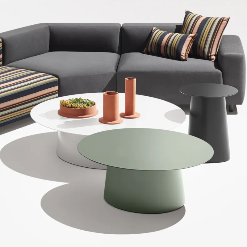 The Circula Small Coffee Table from Blu Dot in a lounge.
