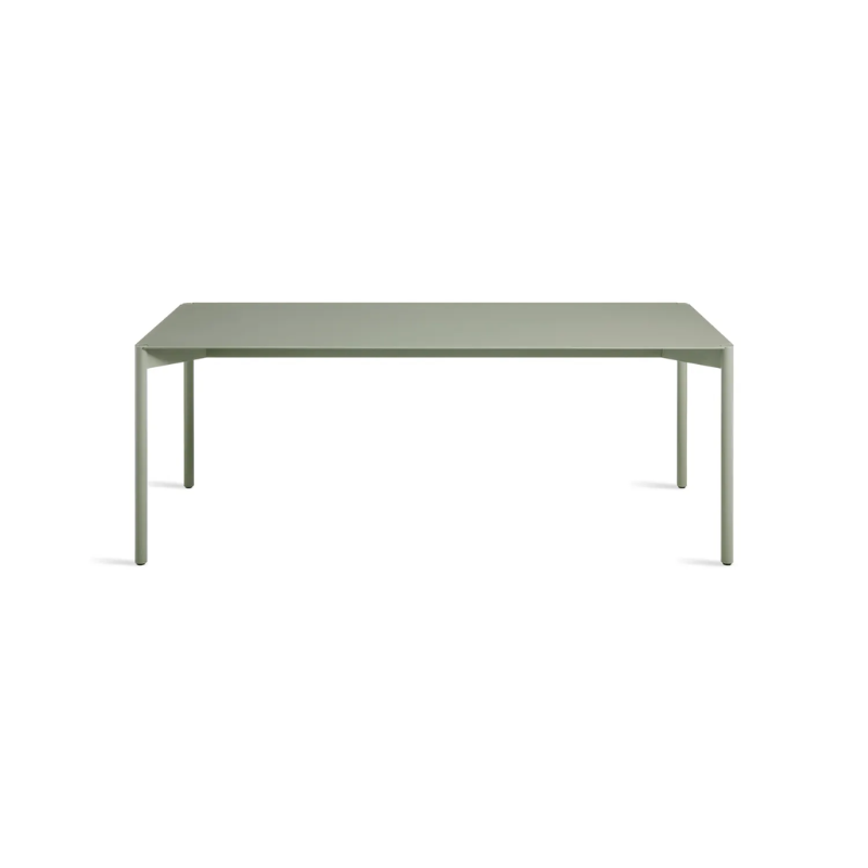The Comeuppance Dining Table from Blu Dot in grey green from a high angle.