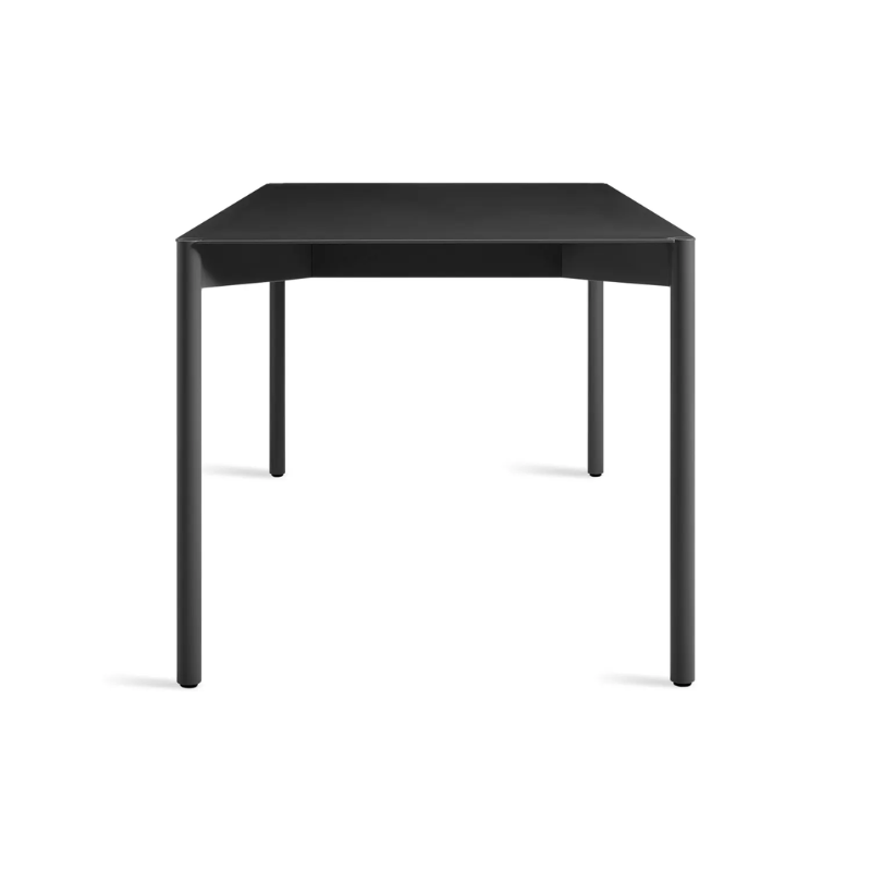 The Comeuppance Dining Table from Blu Dot in oblivion from the side.