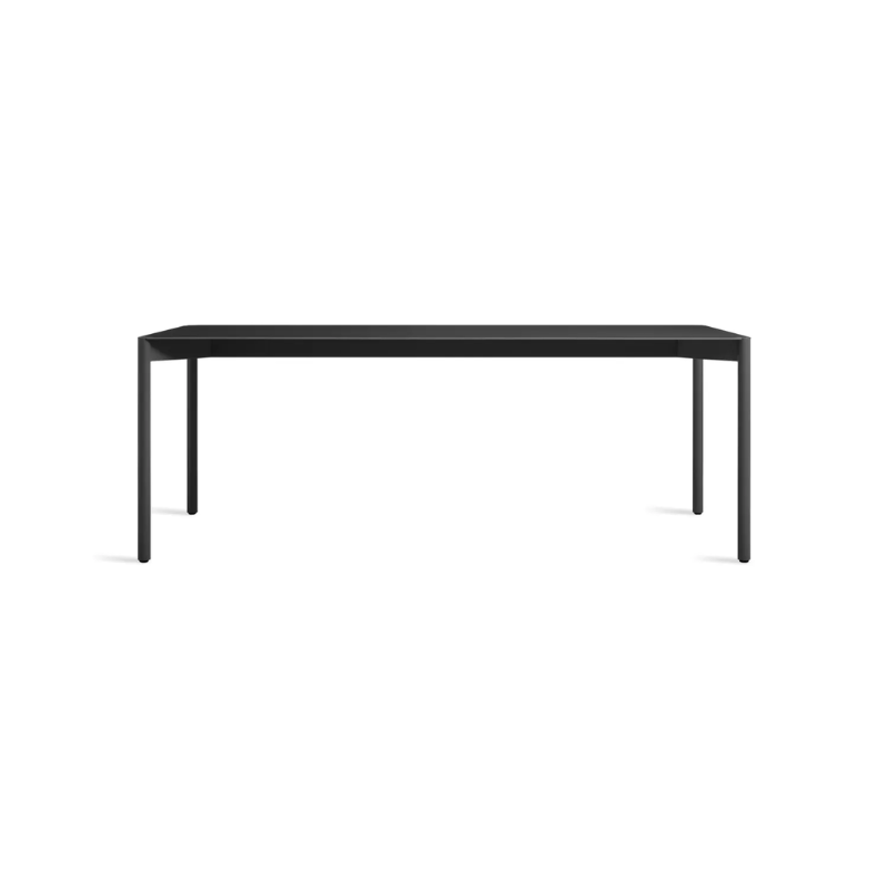 The Comeuppance Dining Table from Blu Dot in oblivion.