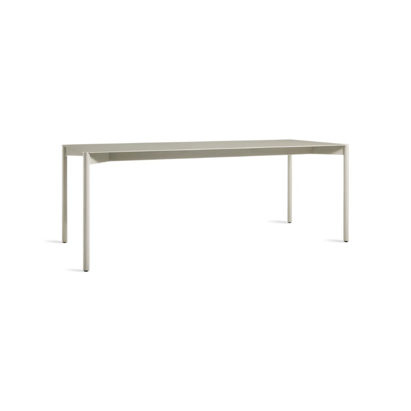 The Comeuppance Dining Table from Blu Dot in putty from an angle.