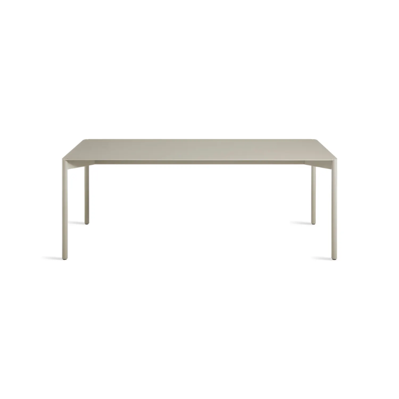 The Comeuppance Dining Table from Blu Dot in putty from a high angle.