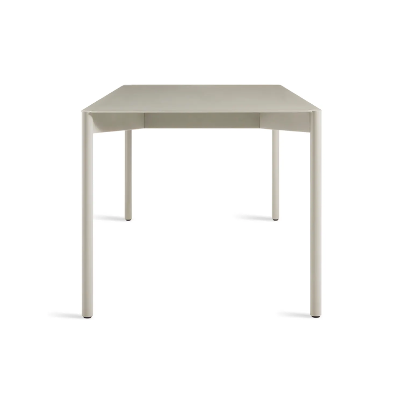 The Comeuppance Dining Table from Blu Dot in putty from the side.