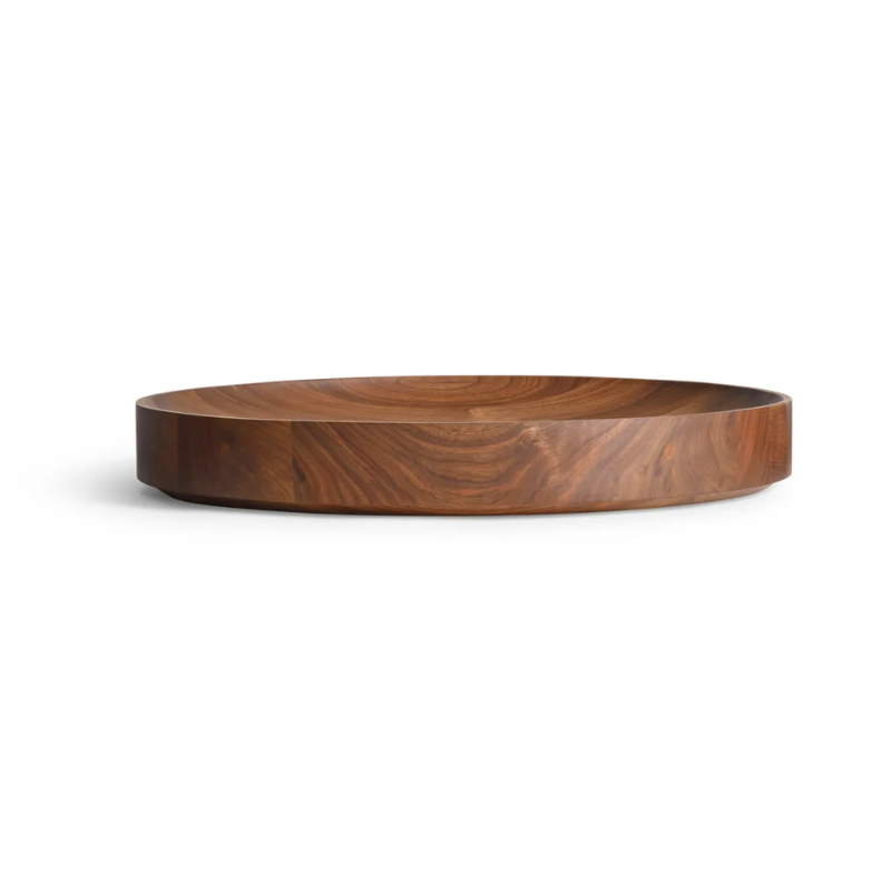 The Cusp Large Bowl from Blu Dot in walnut from the side.