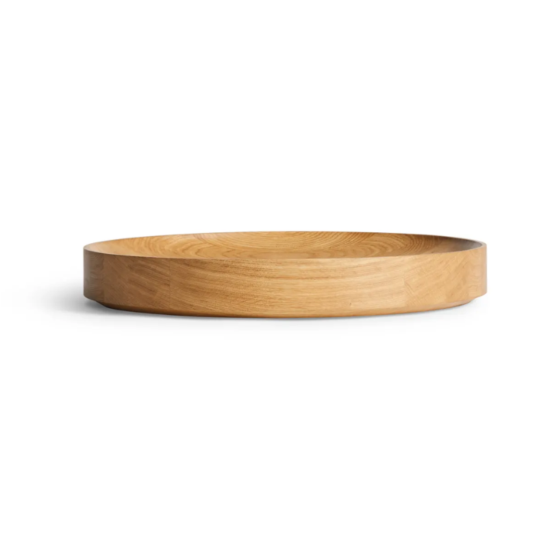 The Cusp Large Bowl from Blu Dot in white oak from the side.