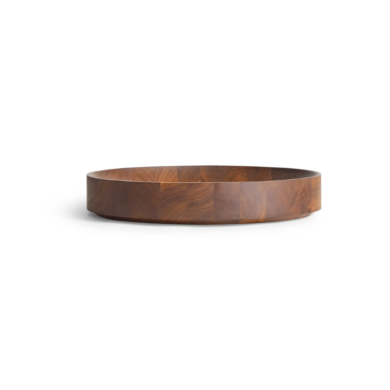 The Cusp Medium Bowl from Blu Dot in walnut from an angle.