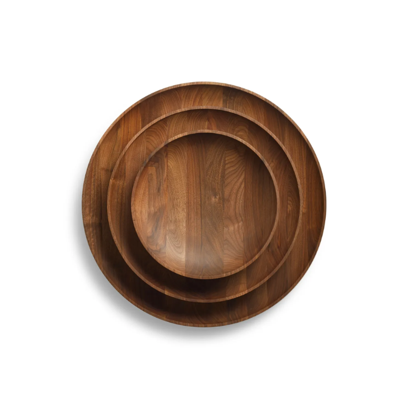 The Cusp Medium Bowl from Blu Dot in walnut set of three stacked.