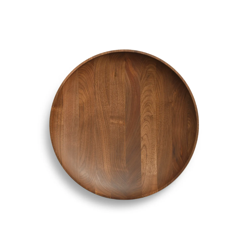 The Cusp Medium Bowl from Blu Dot in walnut in a view from the top.