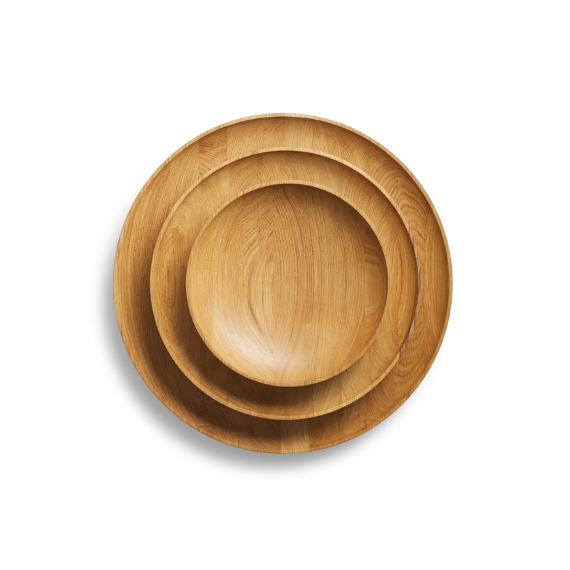 The Cusp Medium Bowl from Blu Dot in white oak set of three stacked.