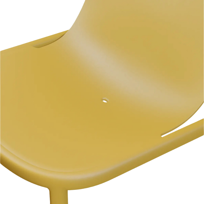 The Decade Lounge Chair from Blu Dot in mustard focusing on the seat.