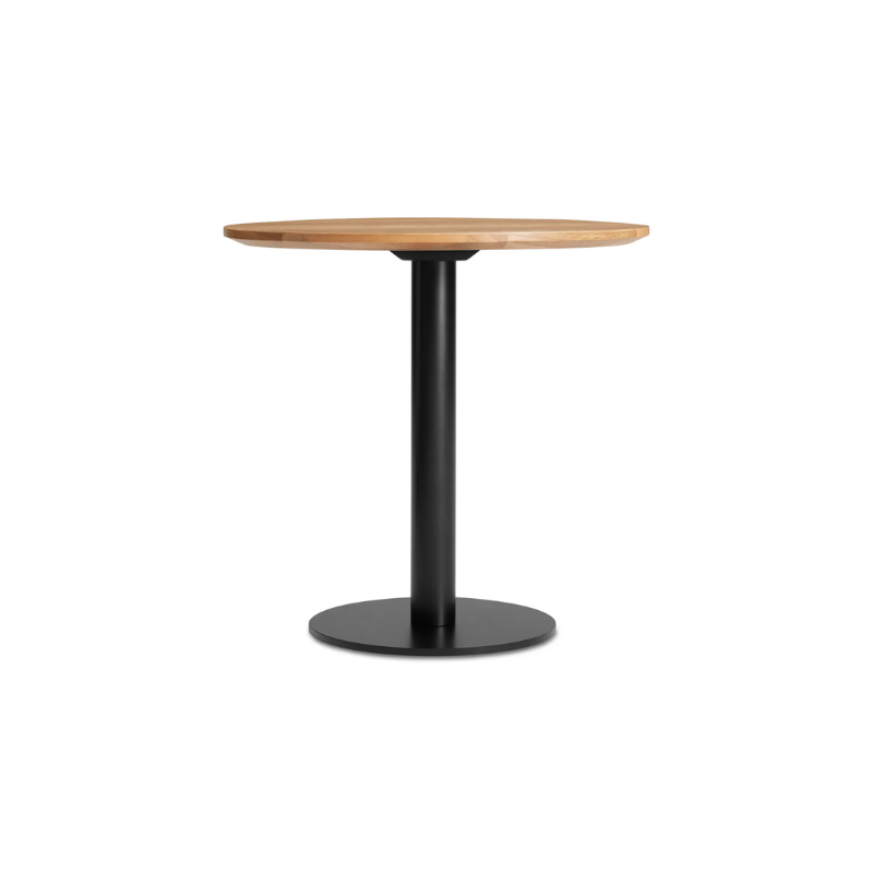 The 30 inch round Easy Dining Table from Blu Dot with a white oak top and black base.