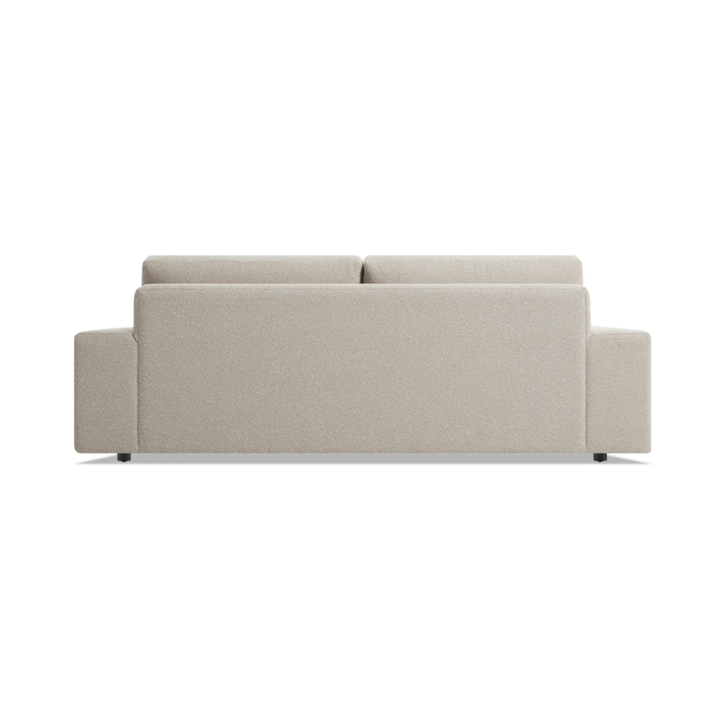 The 82 inch Esker Sofa from Blu Dot in Kelso sand from the back.