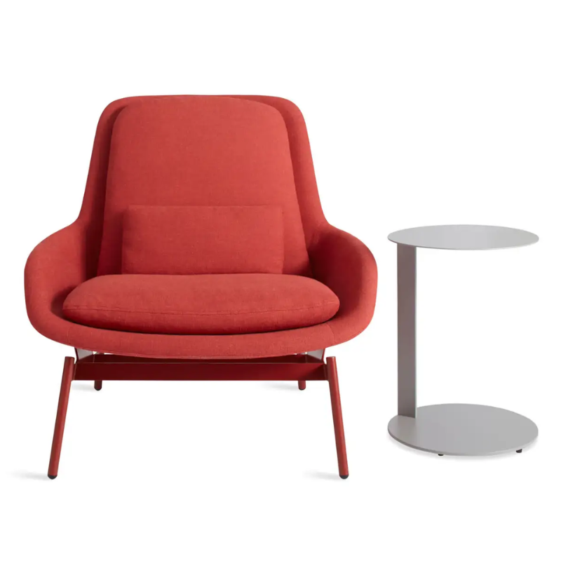 The Field Lounge Chair from Blu Dot in craig red with a side table.