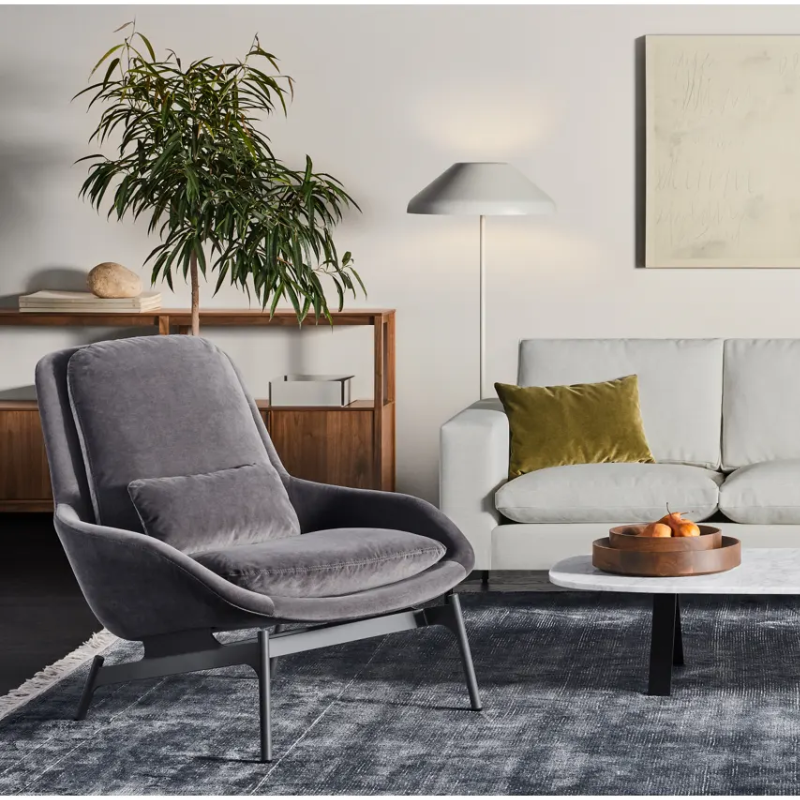 The Field Lounge Chair from Blu Dot in a lounge area.