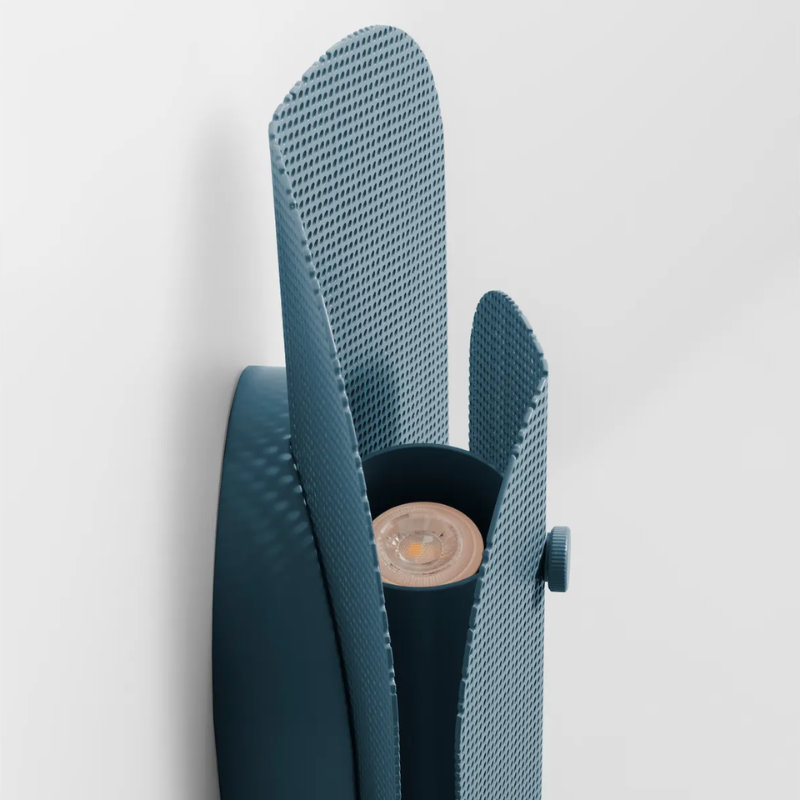 The Filter Sconce from Blu Dot in marine blue close up.