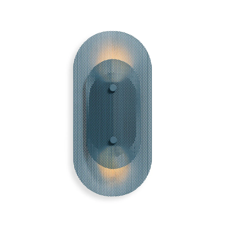 The Filter Sconce from Blu Dot in marine blue turned on.