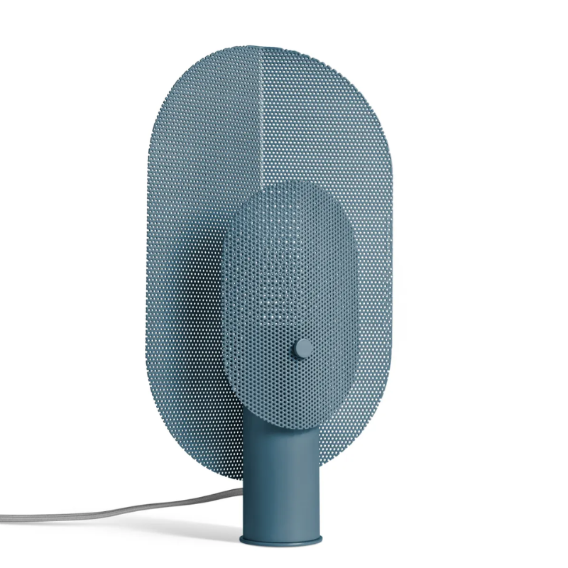 The Filter Table Lamp from Blu Dot in marine blue from an angle.