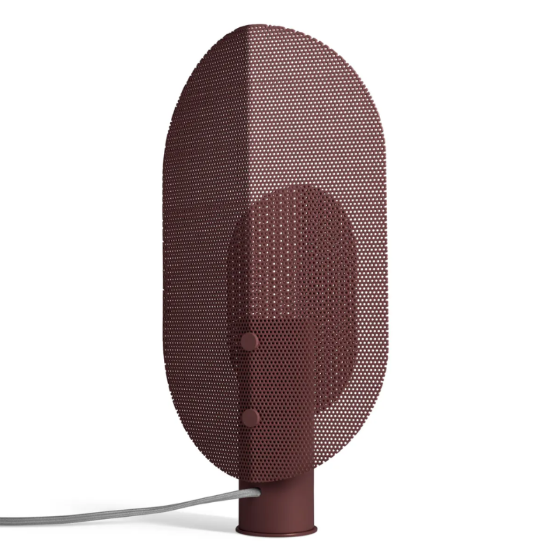 The Filter Table Lamp from Blu Dot in oxblood from the back at an angle.