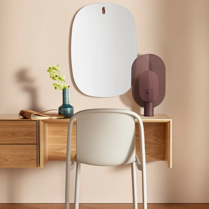 The Filter Table Lamp from Blu Dot in oxblood in a bedroom. all-groups