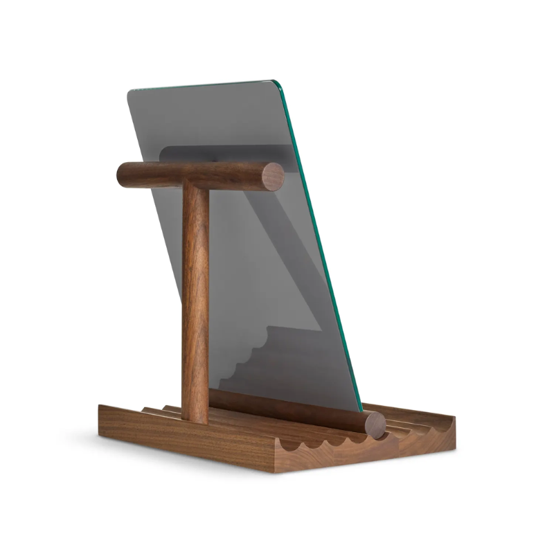 The Furrow Table Mirror from Blu Dot in walnut from the back at an angle.