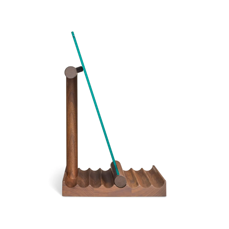 The Furrow Table Mirror from Blu Dot in walnut from the side.