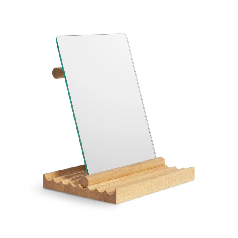 The Furrow Table Mirror from Blu Dot in white oak from an angle.