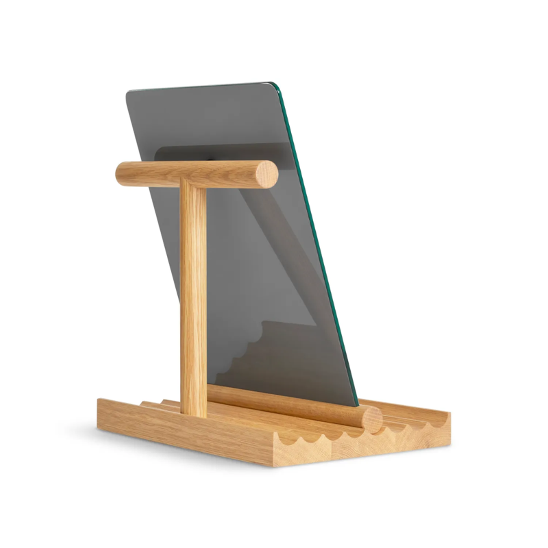 The Furrow Table Mirror from Blu Dot in white oak from the back at an angle.