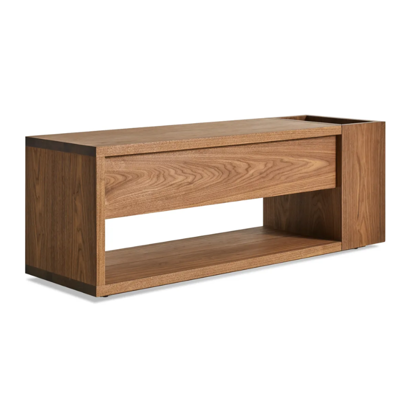 The Go Forth Bench from Blu Dot in walnut from an angle.