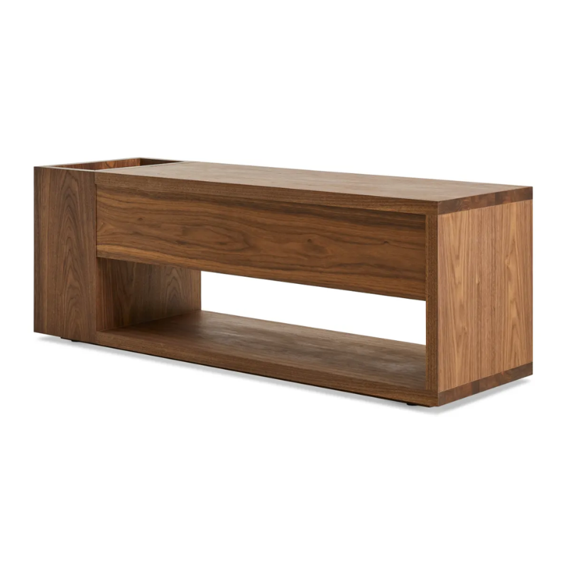 The Go Forth Bench from Blu Dot in walnut from the back at an angle.