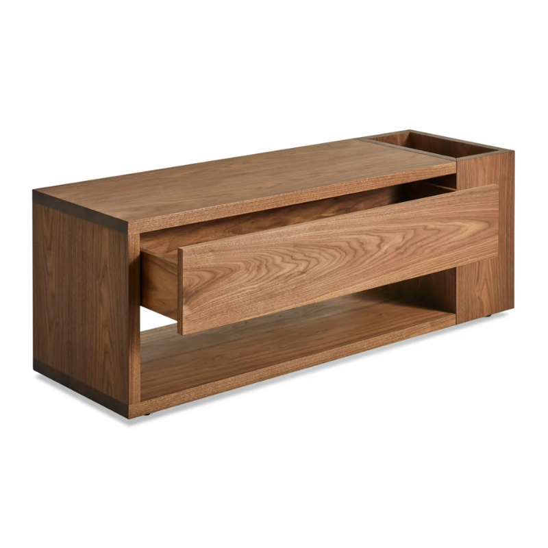 The Go Forth Bench from Blu Dot in walnut with an open drawer from a high angle.