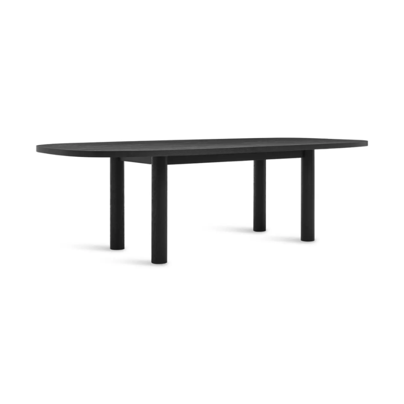 The 100 inch Good Times Dining Table from Blu Dot in black on ash from an angle.